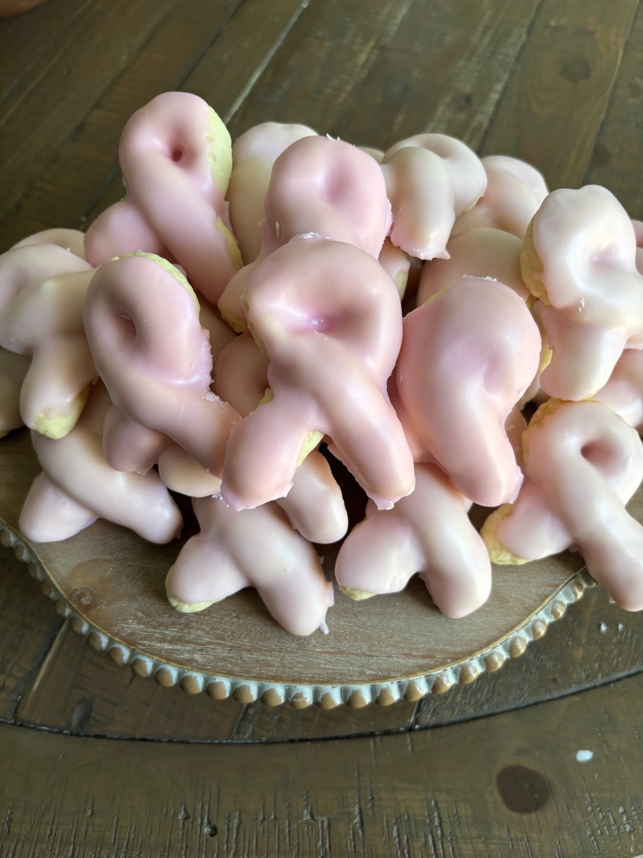 Pink glazed Knots on a serving platter