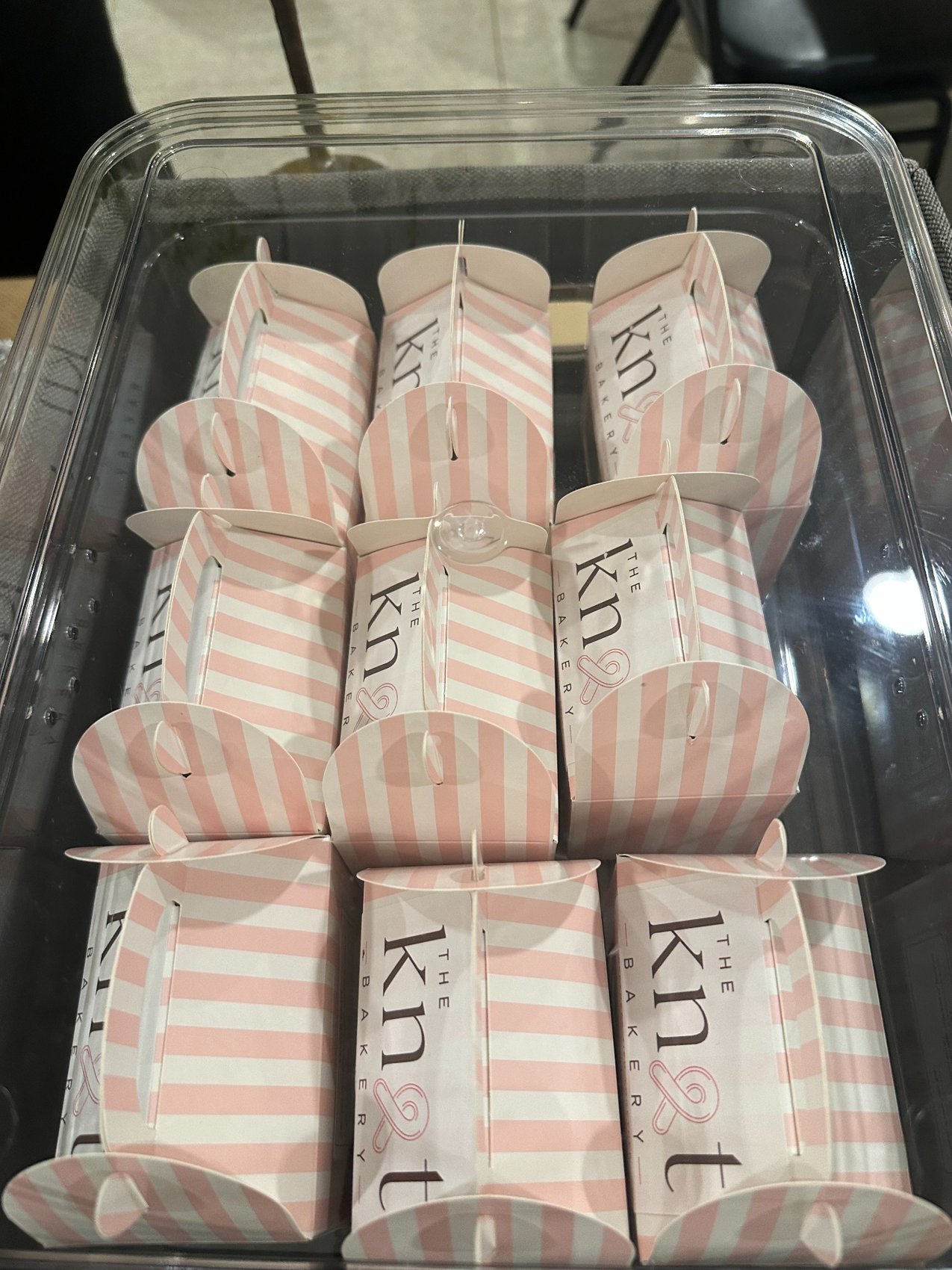 Pink striped favors packed for a gathering