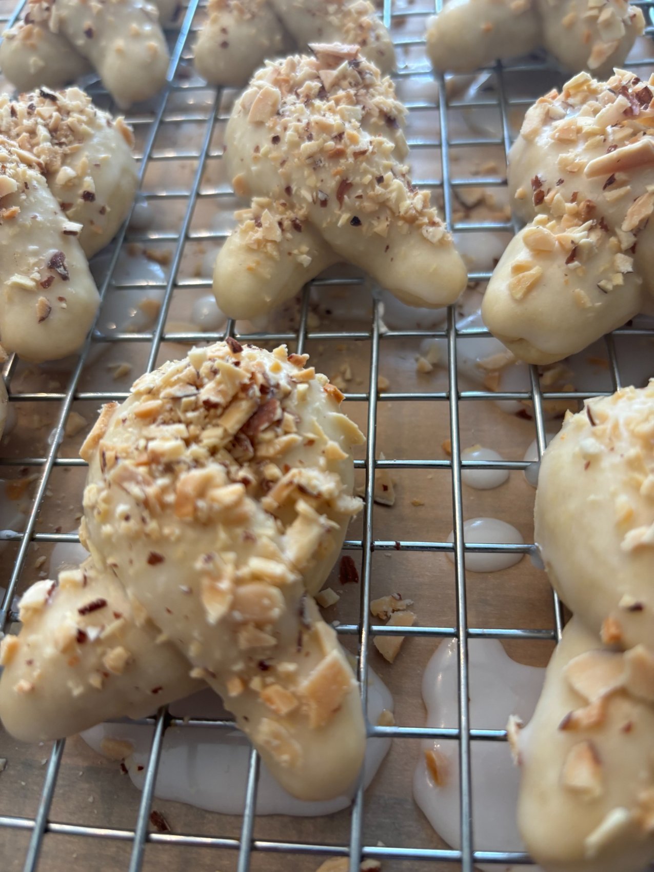 Nut topped Knots cooling on a rack